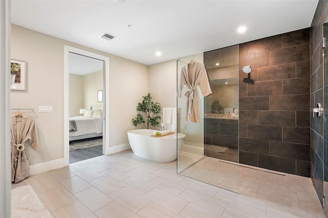 bathroom featuring tile patterned floors and plus walk in shower