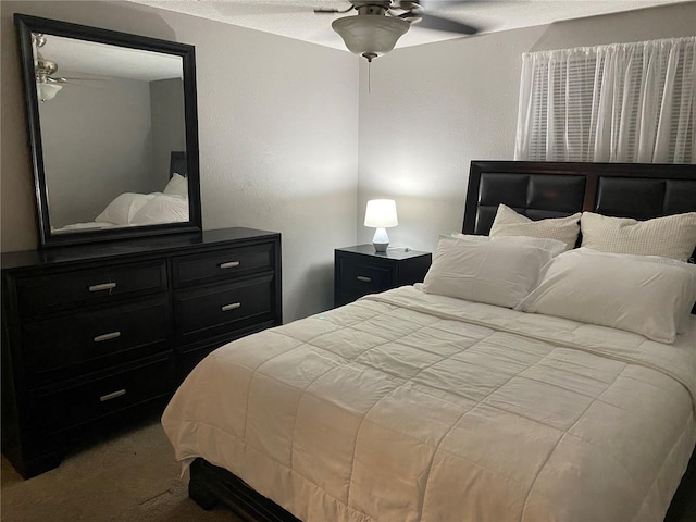 bedroom with carpet flooring and ceiling fan