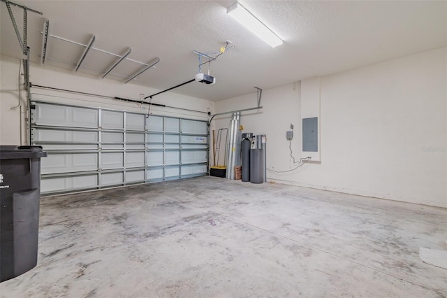 garage featuring electric panel and a garage door opener