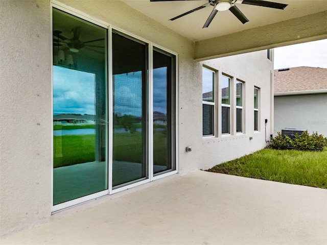 view of patio featuring ceiling fan