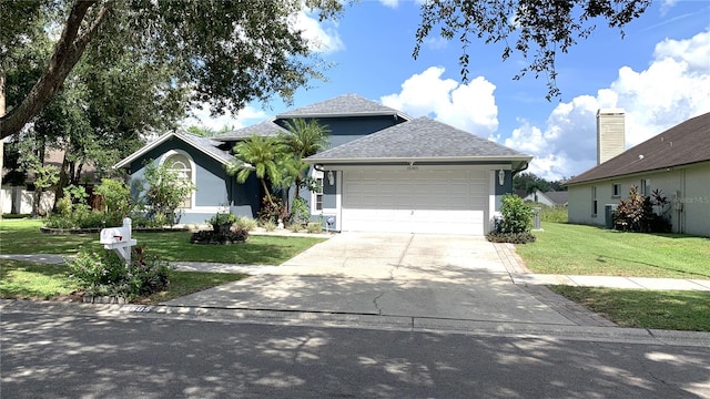 view of front facade with cooling unit, a garage, and a front lawn