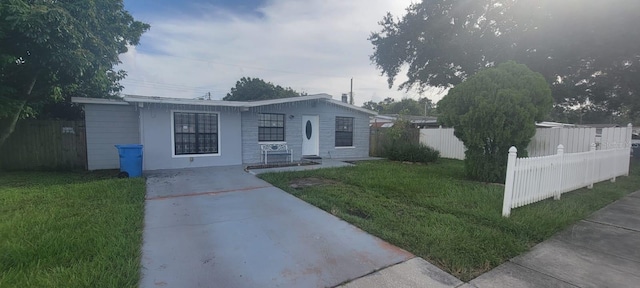 view of front of home with a front lawn