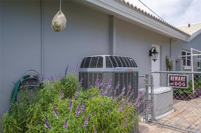 exterior space featuring central air condition unit