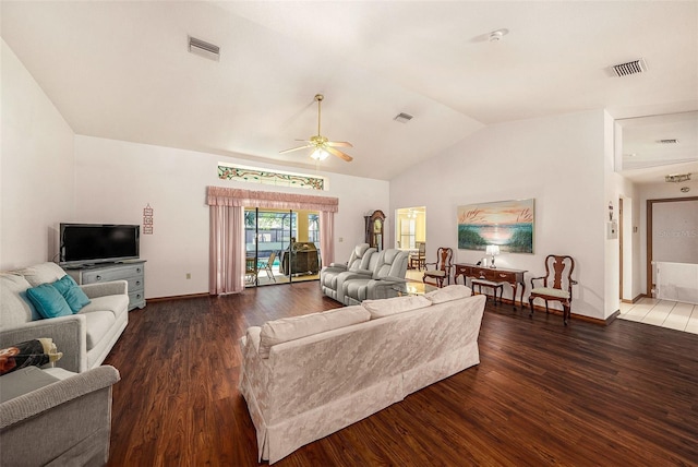 living room featuring ceiling fan, dark hardwood / wood-style flooring, and lofted ceiling