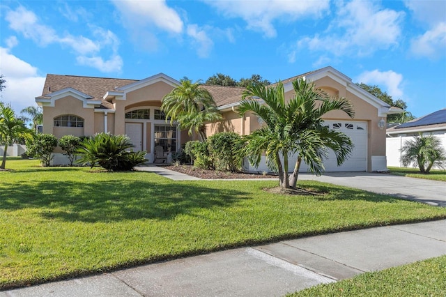 single story home featuring a front yard and a garage