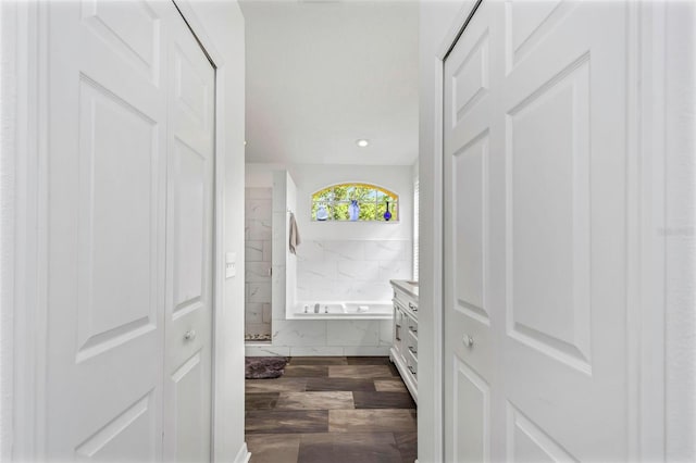 corridor with dark wood-type flooring