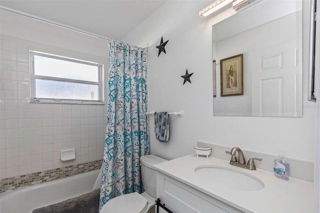 full bathroom with toilet, vanity, and shower / bath combination with curtain