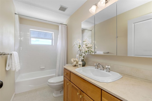 1215 Bayshore Dr, Terra Ceia, FL 34250 - full bath with vanity, toilet, and shower / bath combo with shower curtain