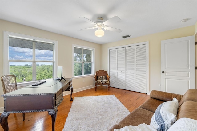 1215 Bayshore Dr, Terra Ceia, FL 34250 - office area with ceiling fan, baseboards, and light wood finished floors