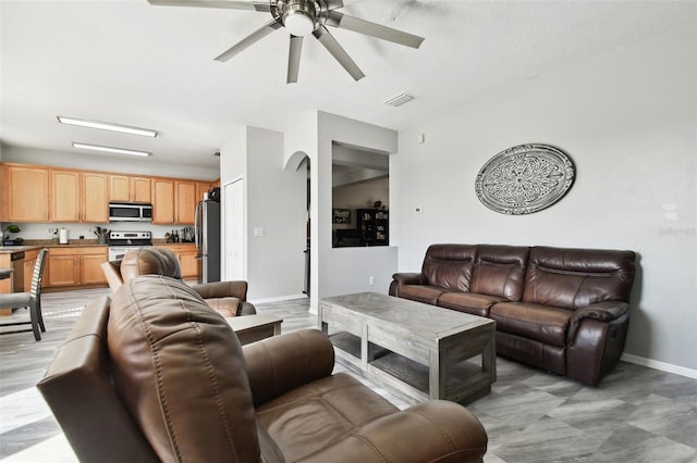 living room with ceiling fan