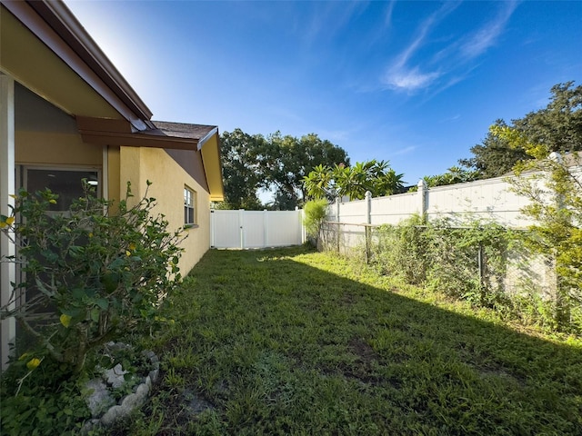 view of yard featuring a fenced backyard