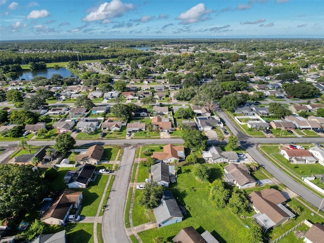 aerial view featuring a residential view and a water view