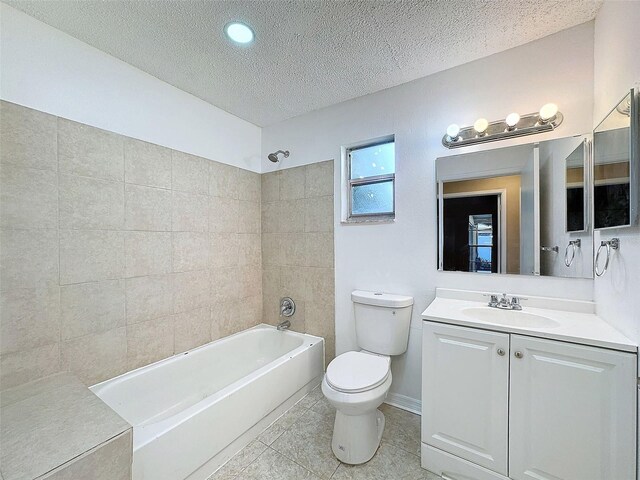 full bathroom with toilet, a textured ceiling, tile patterned flooring, bathtub / shower combination, and vanity