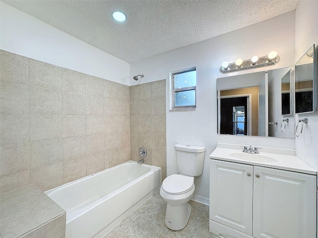bathroom with vanity, tile patterned floors, a textured ceiling, toilet, and tub / shower combination