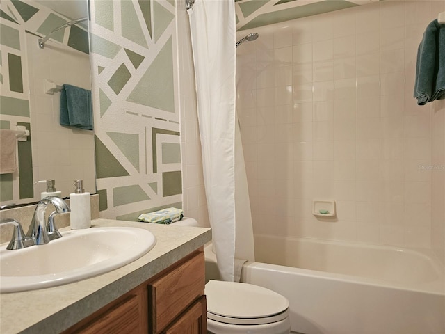 full bathroom featuring toilet, vanity, and shower / bath combo with shower curtain