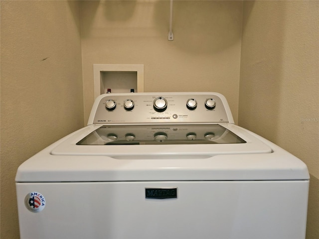 washroom featuring washer / dryer