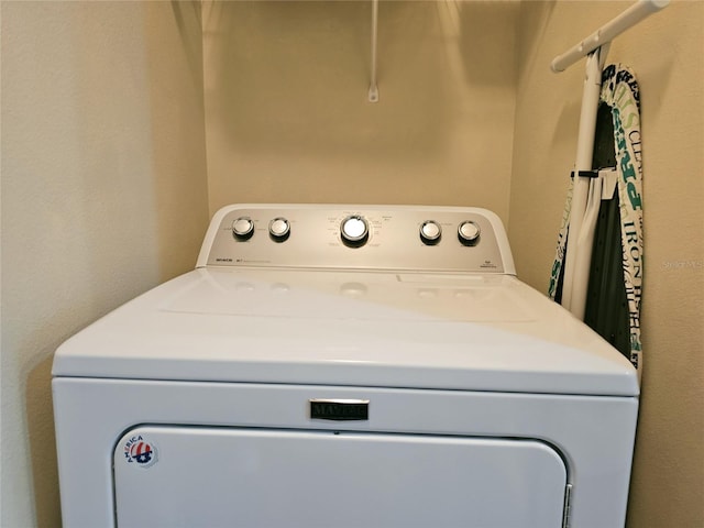 laundry area with washer / dryer