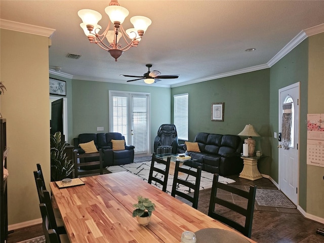 dining room featuring wood-type flooring, crown molding, and ceiling fan with notable chandelier