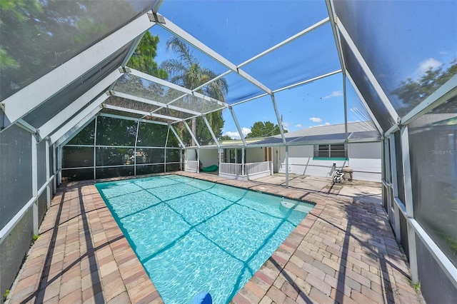 3908 W Wallace Ave, Tampa, FL 33611 - pool with a lanai and a patio
