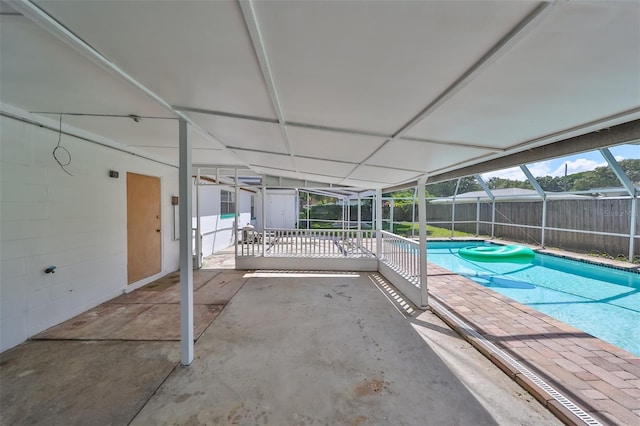 3908 W Wallace Ave, Tampa, FL 33611 - view of pool with a patio area, fence, glass enclosure, and a fenced in pool