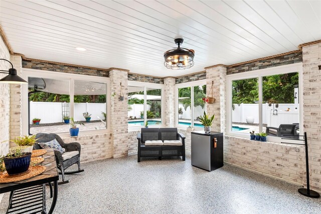 view of patio featuring a fenced in pool