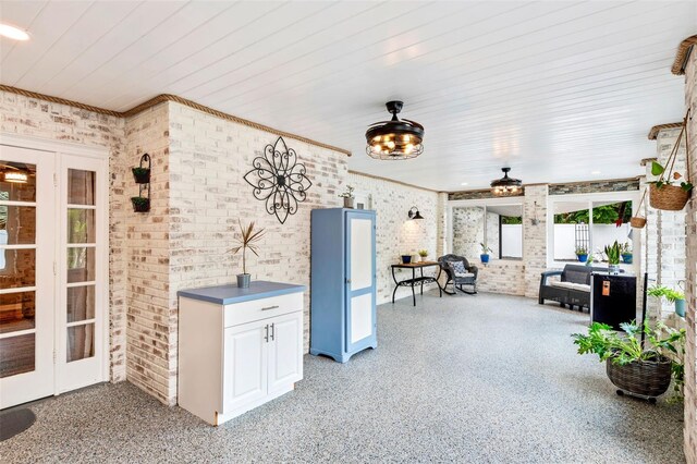 view of patio with french doors and ceiling fan