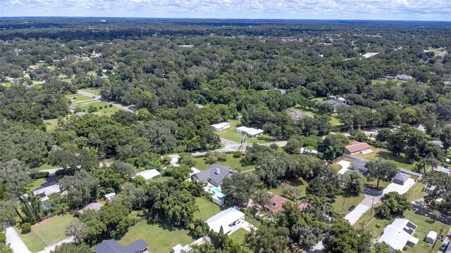 bird's eye view with a forest view