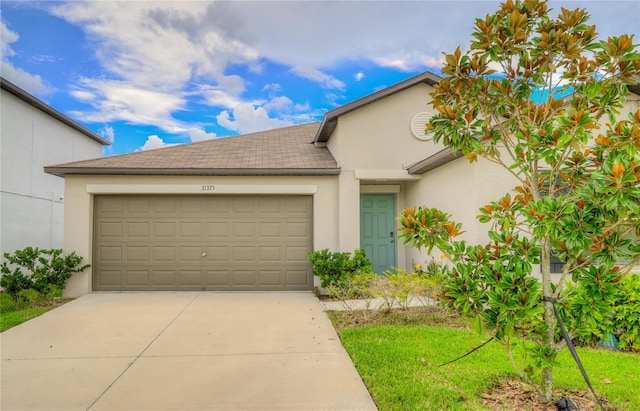 view of front of home featuring a garage