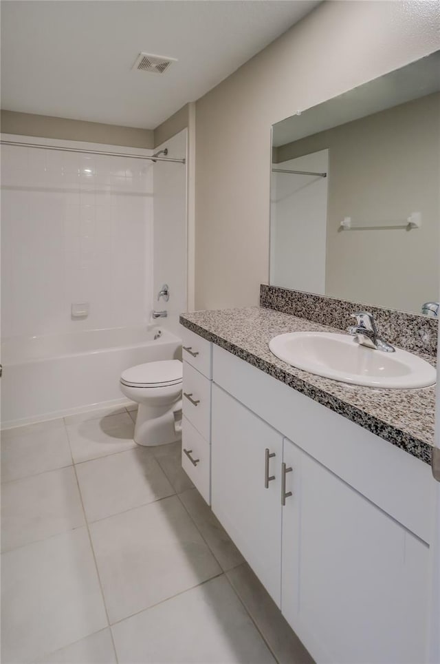 full bathroom with vanity, toilet, shower / bathtub combination, and tile patterned floors