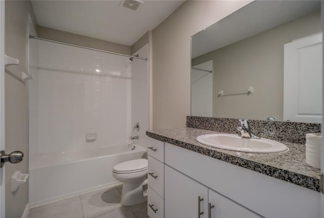 full bathroom with tile patterned floors, washtub / shower combination, toilet, and vanity