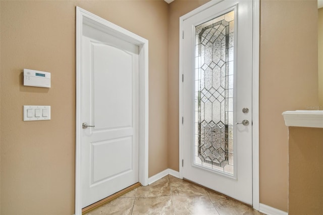 view of tiled entrance foyer