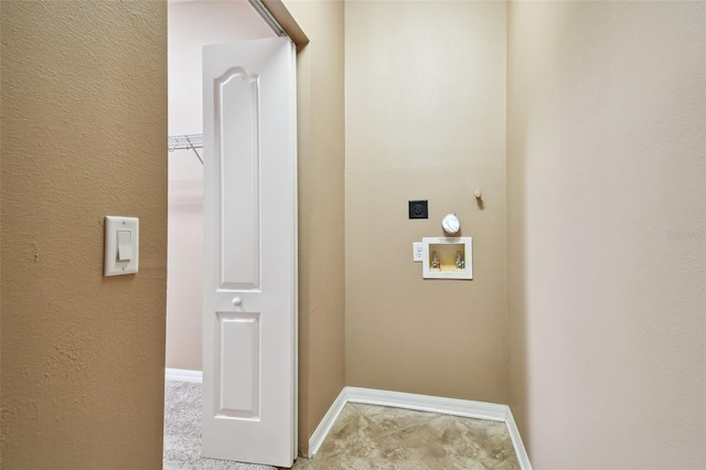 laundry area with hookup for a washing machine and hookup for an electric dryer