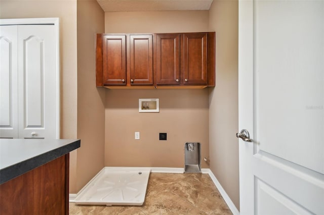 washroom featuring washer hookup, gas dryer hookup, cabinets, and electric dryer hookup