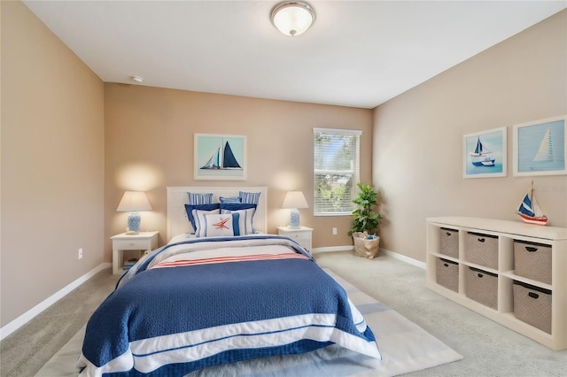 bedroom featuring light carpet