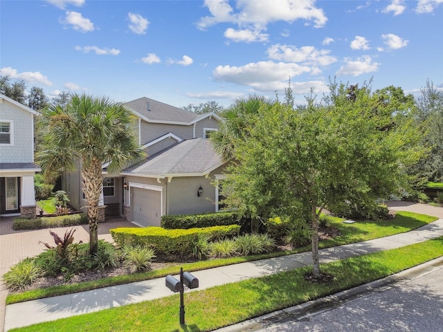 view of front of property with a garage