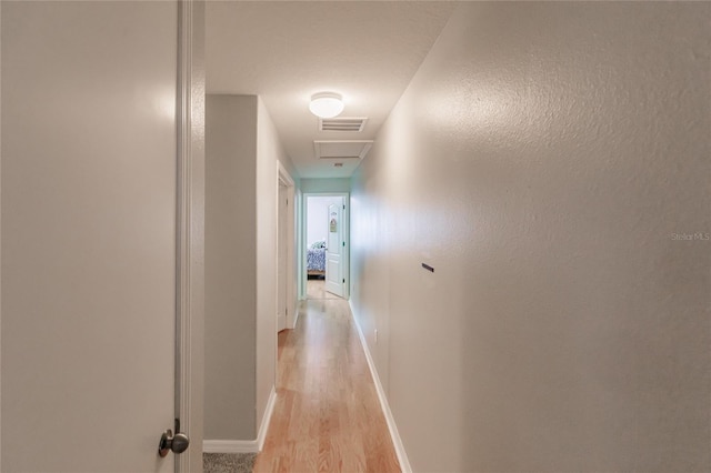 hall featuring light hardwood / wood-style floors