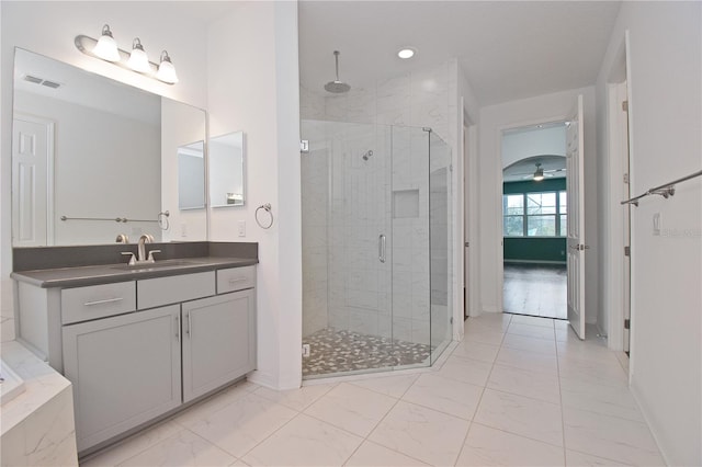 bathroom featuring vanity and walk in shower