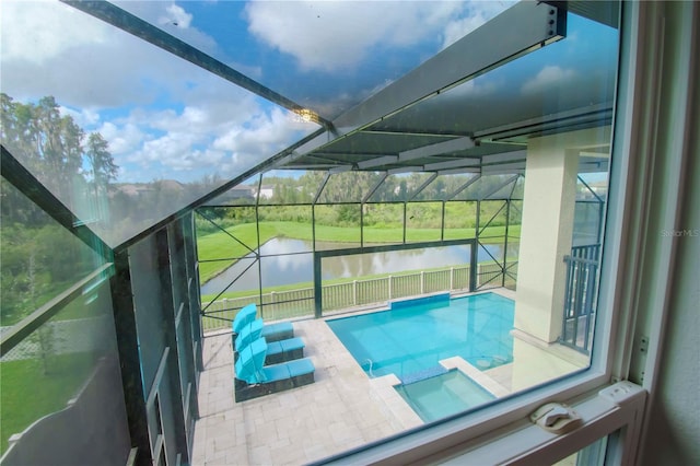 view of pool with a water view, a patio, and a lanai