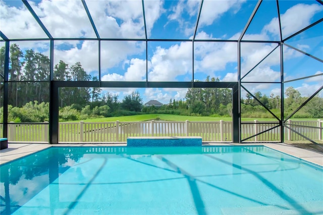 view of pool featuring a water view and glass enclosure