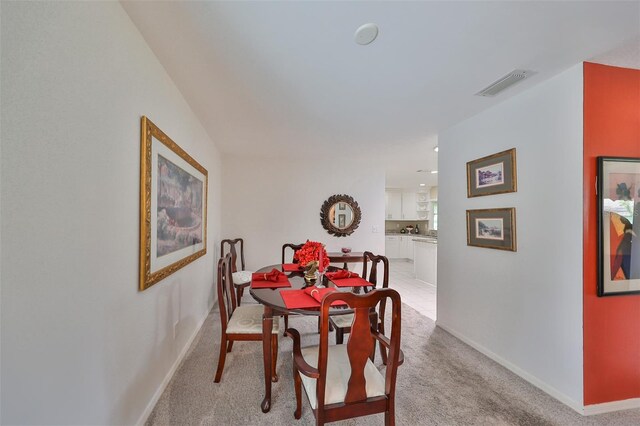 view of carpeted dining room