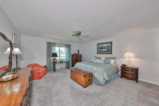 bedroom featuring ceiling fan and carpet floors