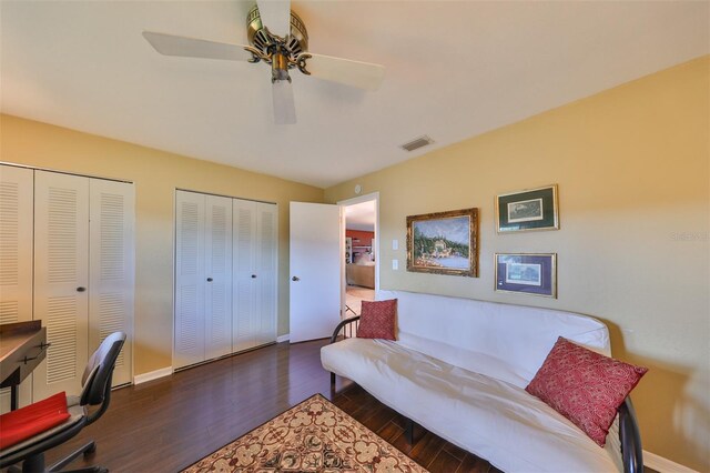 office area with dark hardwood / wood-style flooring and ceiling fan