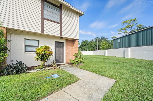 exterior space with a front yard