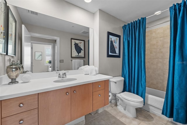 full bathroom with vanity, toilet, shower / tub combo, and tile patterned floors