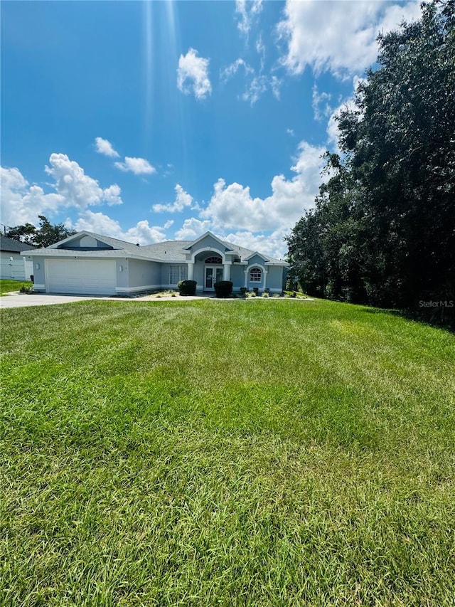 view of yard with a garage