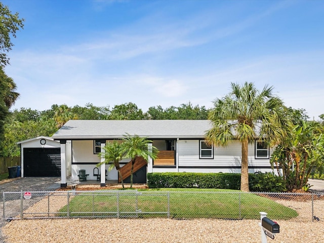 ranch-style home featuring a garage