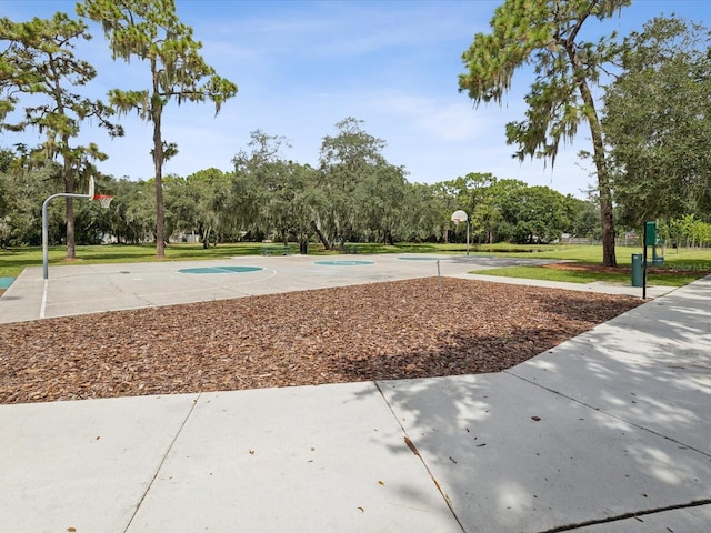 view of community featuring basketball hoop