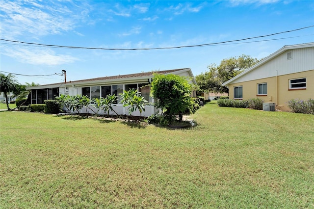 view of yard featuring central AC