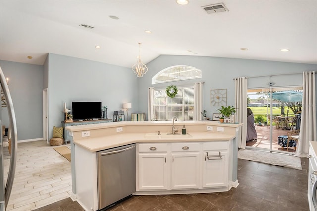 kitchen with open floor plan, stainless steel dishwasher, a sink, and visible vents