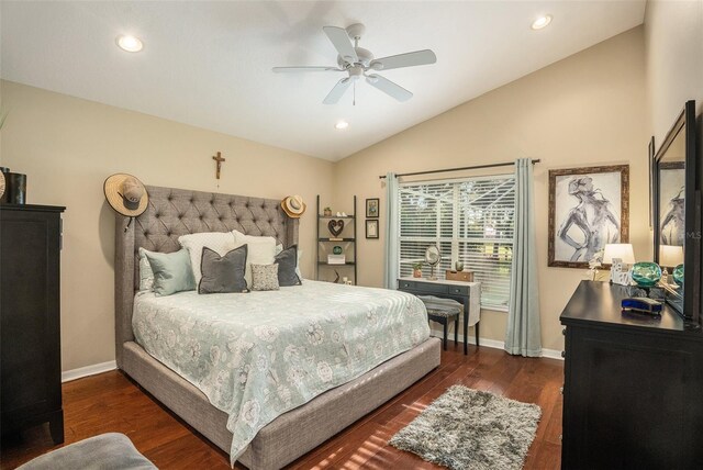 bedroom featuring vaulted ceiling, dark hardwood / wood-style floors, and ceiling fan